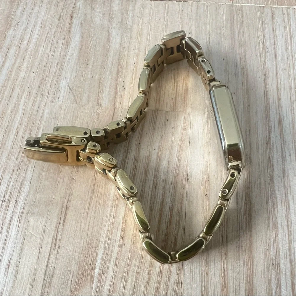 Citizen eco drive ladies gold tone hexagonal bracelet watch